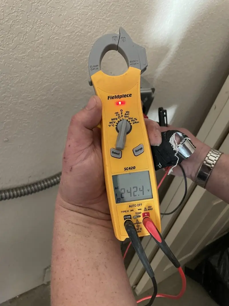 Voltage testing with clamp meter during Circuit Breaker Repair in Edgemere